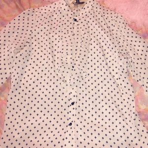Black and white patten blouse worn